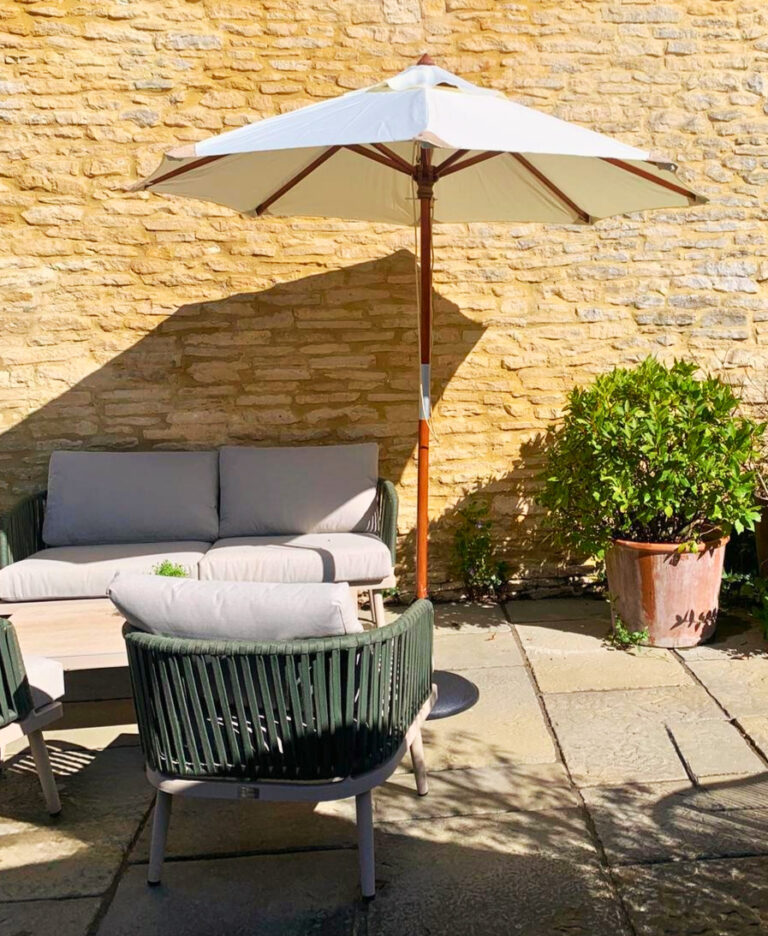 Comfy seating and shaded areas in our pub garden